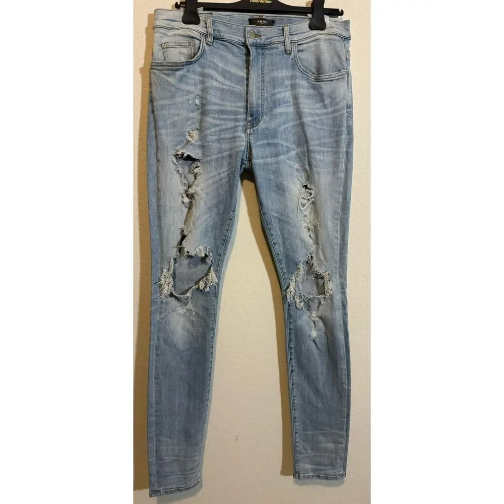 EUC Amiri Distressed Denim Skinny Jeans